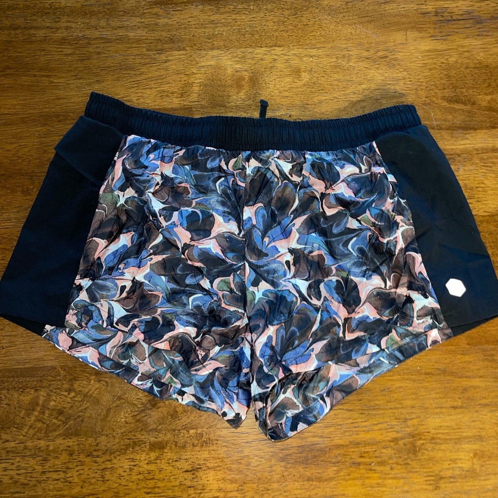 ASICS running shorts, swirl pattern, worn once